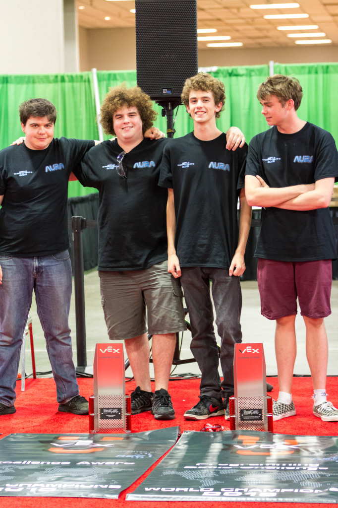 Our team tries to figure out how to stand for a photo after being presented with our awards.